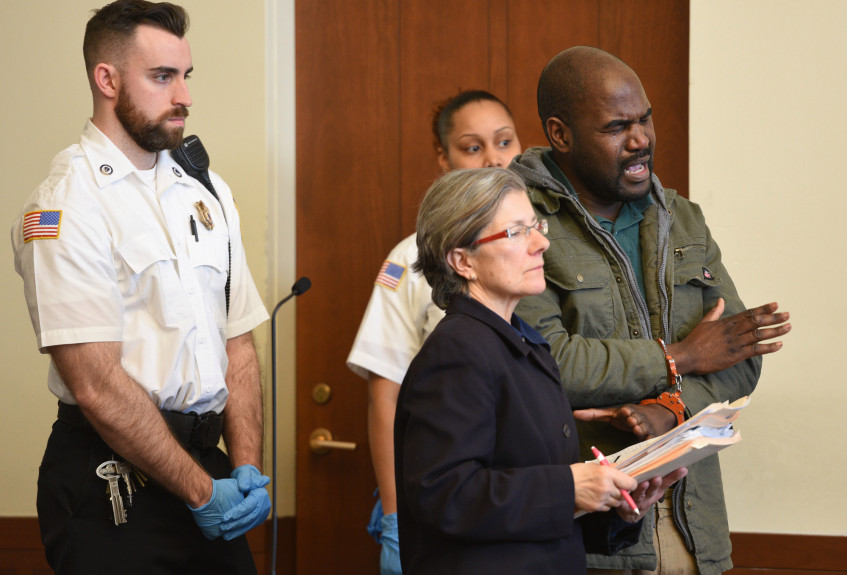 BOSTON, MA- APRIL 01, 2019:  Mayanja Daudah, 37 of Waltham is seen with his attorney, Kim Giampietro during his arraignment in Boston Municipal Court. Daudah was arrested by Mass State Police for allegedly sexually assaulting a passenger while working as a ride-share Uber driver.   April 01, 2019 (Staff Photo By Faith Ninivaggi/Boston Herald/Media News Group)